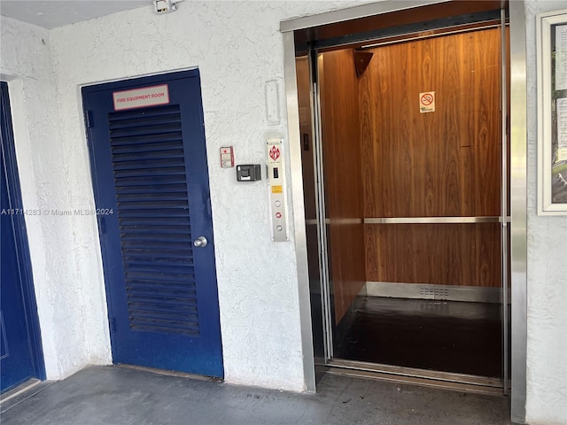 entrance to property featuring elevator