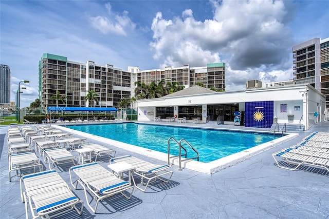 view of swimming pool featuring a patio