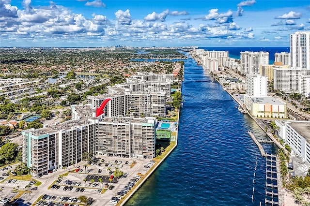 birds eye view of property featuring a water view