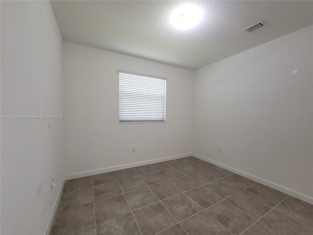 view of tiled empty room