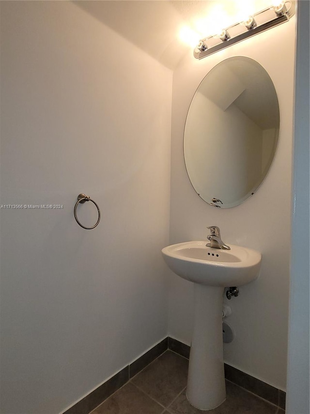 bathroom with tile patterned flooring