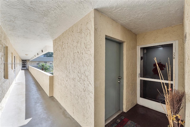 doorway to property featuring a balcony