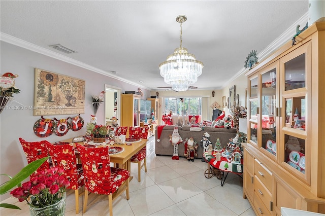 tiled dining area featuring ornamental molding and a chandelier