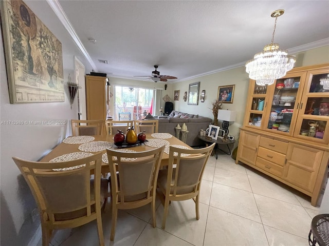 126 Sparrow Dr Unit 22B, Royal Palm Beach, FL 33411 - dining space featuring crown molding, a ceiling fan, light tile patterned floors, and a chandelier