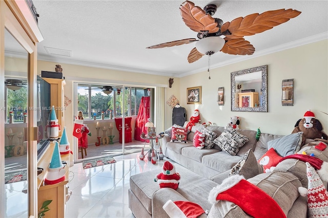 tiled living room with ceiling fan, ornamental molding, and a textured ceiling