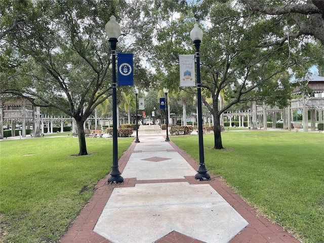 126 Sparrow Dr Unit 22B, Royal Palm Beach, FL 33411 - view of home's community featuring a yard