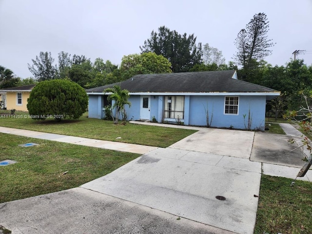 ranch-style house with a front yard