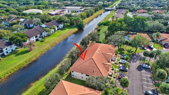 drone / aerial view with a water view