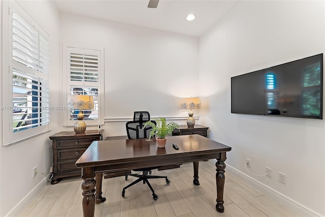 home office featuring light hardwood / wood-style floors