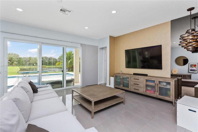 living room featuring light tile patterned flooring