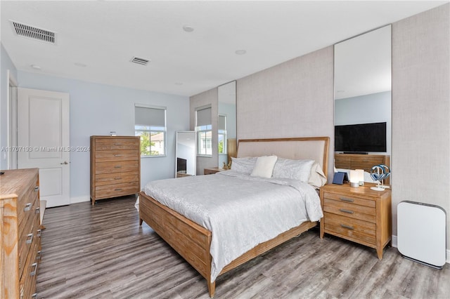 bedroom featuring hardwood / wood-style floors