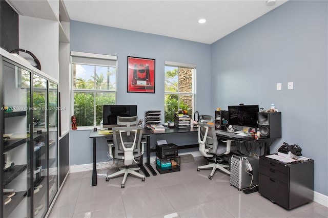 home office with light tile patterned flooring