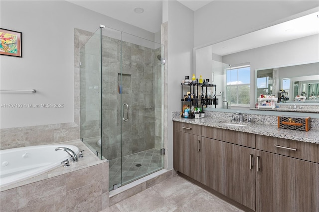 10410 Ranchette Dr, Cooper City, FL 33328 - bathroom with vanity, a bath, a shower stall, and tile patterned floors