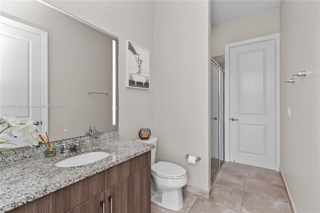 10410 Ranchette Dr, Cooper City, FL 33328 - bathroom with a stall shower, vanity, toilet, baseboards, and tile patterned floors
