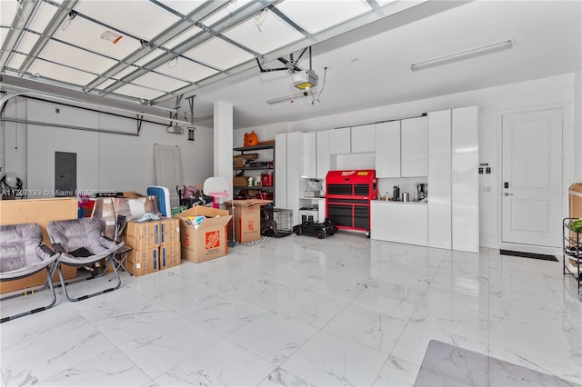 10410 Ranchette Dr, Cooper City, FL 33328 - garage featuring a garage door opener and electric panel