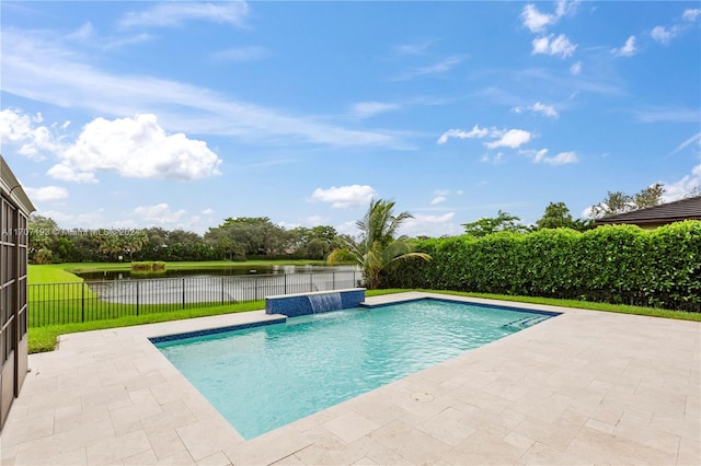 view of swimming pool featuring pool water feature, a water view, and a patio area