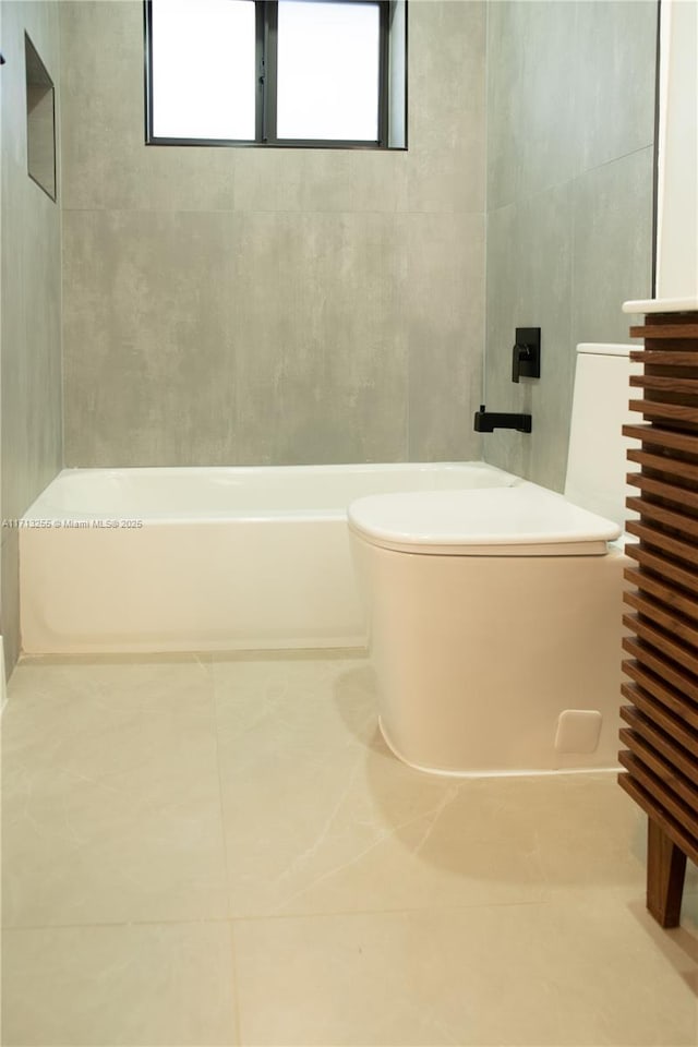 bathroom with tile patterned flooring and toilet