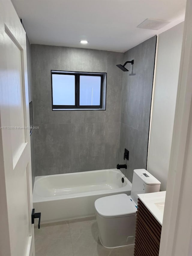 full bathroom featuring tile patterned floors, shower / washtub combination, vanity, and toilet