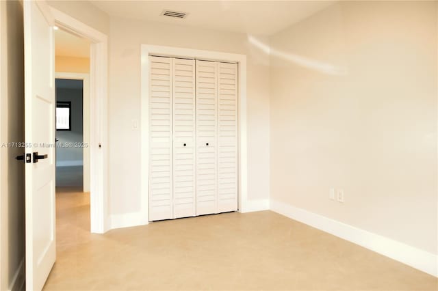 unfurnished bedroom featuring a closet