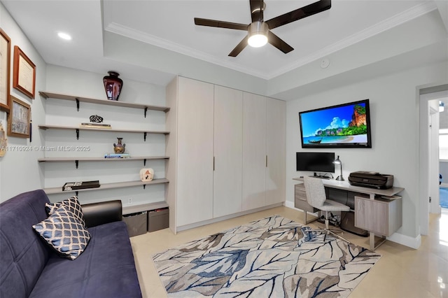 office space with ceiling fan and ornamental molding