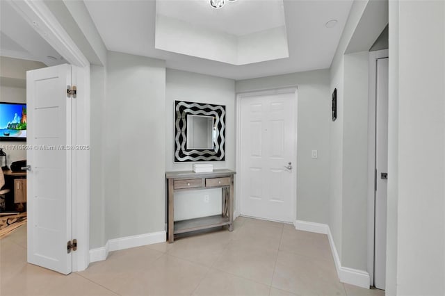 hallway with light tile patterned floors