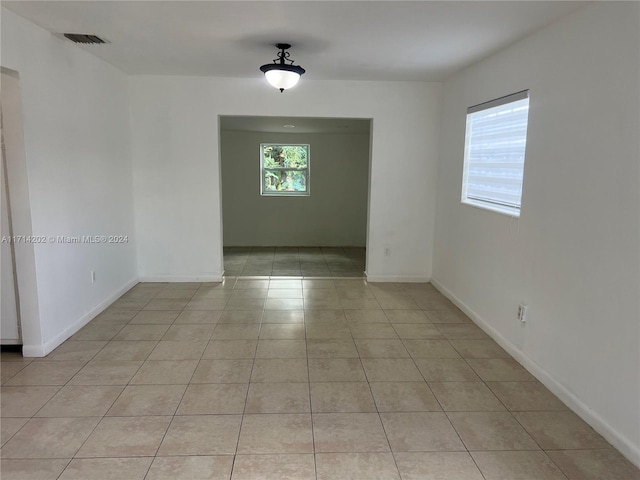 view of tiled empty room