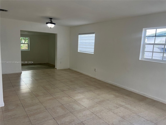 view of tiled empty room