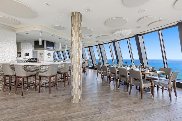 dining room featuring plenty of natural light and expansive windows