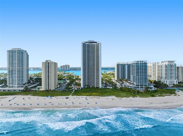 bird's eye view with a view of the beach and a water view