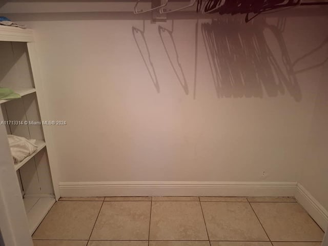 interior space featuring tile patterned flooring