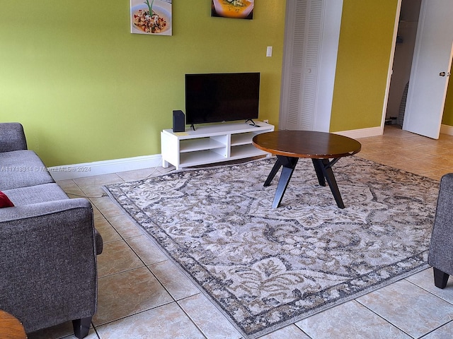 living room featuring tile patterned floors