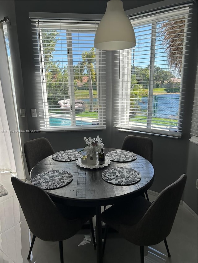 dining room with baseboards