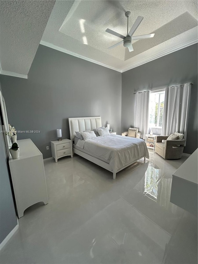 bedroom with a textured ceiling, ceiling fan, and crown molding