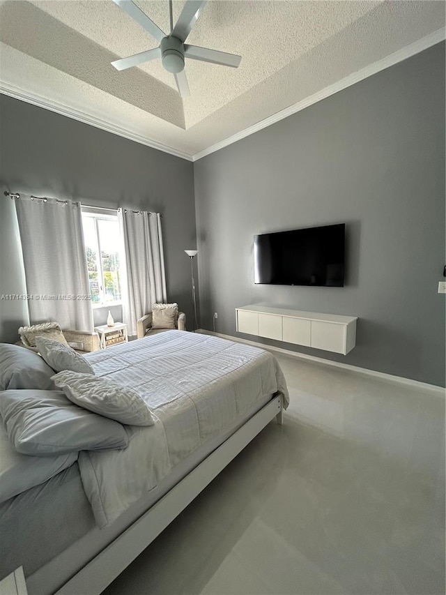 carpeted bedroom featuring crown molding, baseboards, ceiling fan, and a textured ceiling