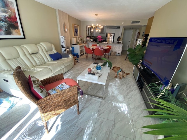 living room with a chandelier