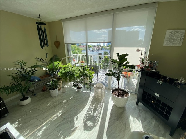 interior space featuring a textured ceiling