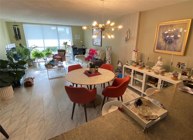 dining room featuring a notable chandelier