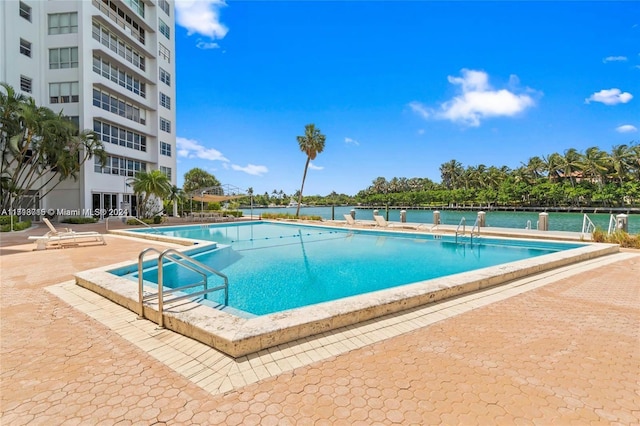 view of pool featuring a patio