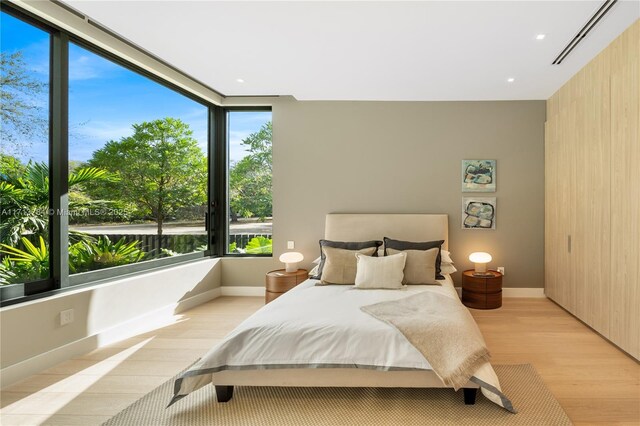 bedroom featuring light wood-type flooring