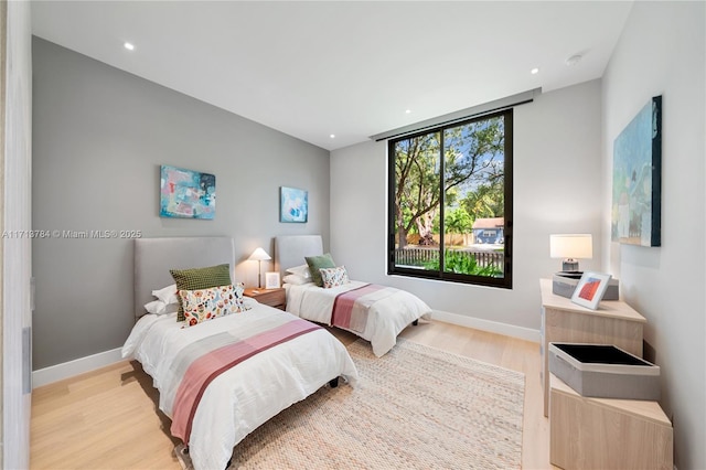 bedroom featuring light hardwood / wood-style floors