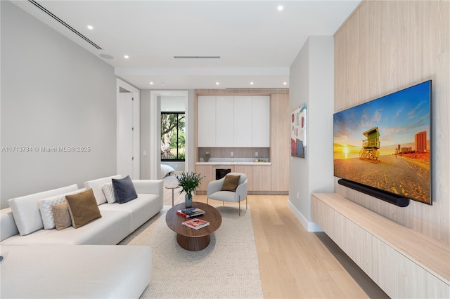 living room with light hardwood / wood-style floors