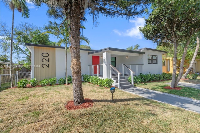 view of front of house with a front yard