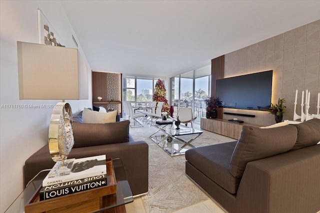 living room with floor to ceiling windows