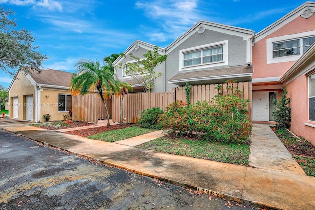 view of front of property with a garage