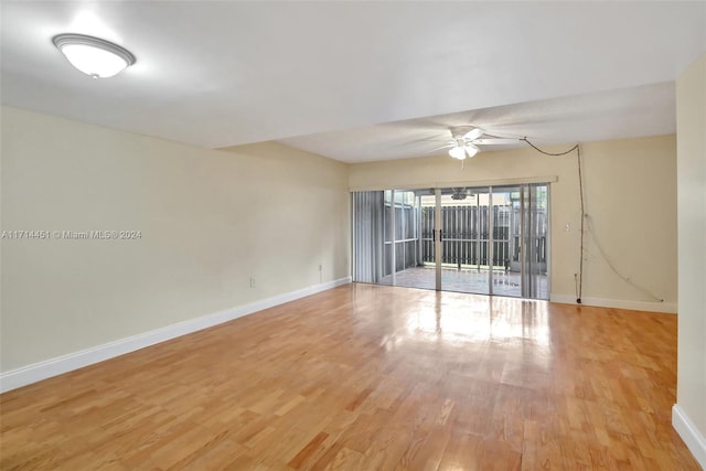 unfurnished room featuring light hardwood / wood-style floors and ceiling fan