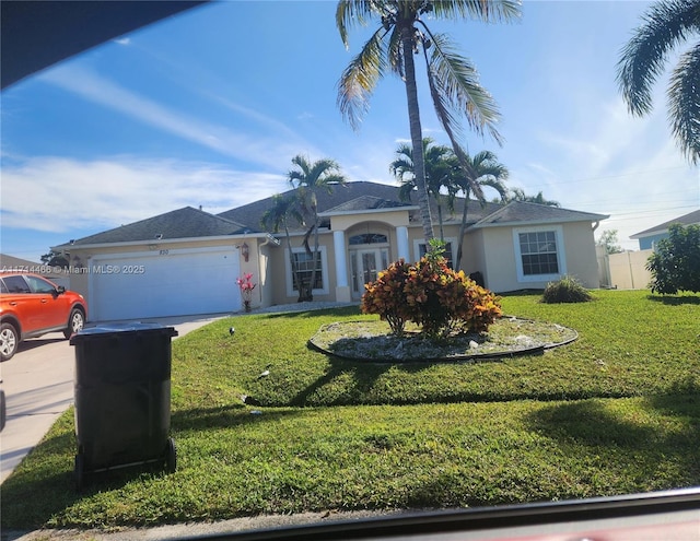 ranch-style house with a front yard and a garage