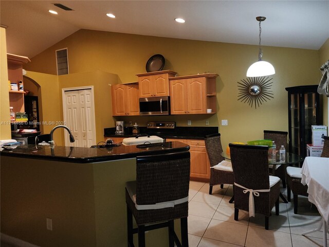 kitchen with kitchen peninsula, vaulted ceiling, electric stove, sink, and light tile patterned floors