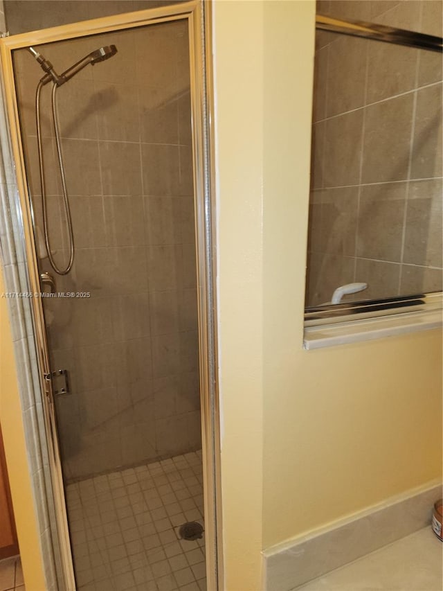 bathroom featuring an enclosed shower