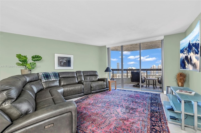 living room featuring floor to ceiling windows