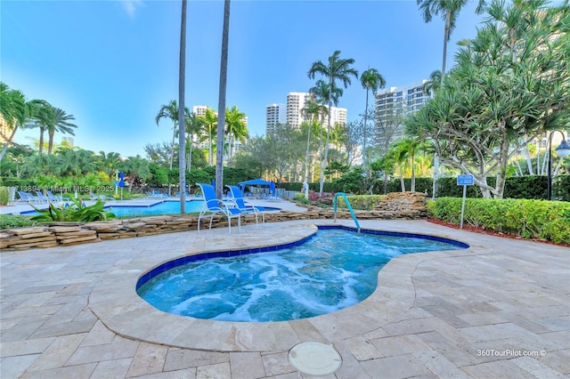 pool with a patio